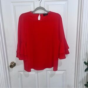 Ltx womens sz med top orange in color